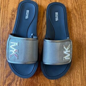 Michael Kors Silver Metallic MK Logo Slide Sandals - Black Footbed